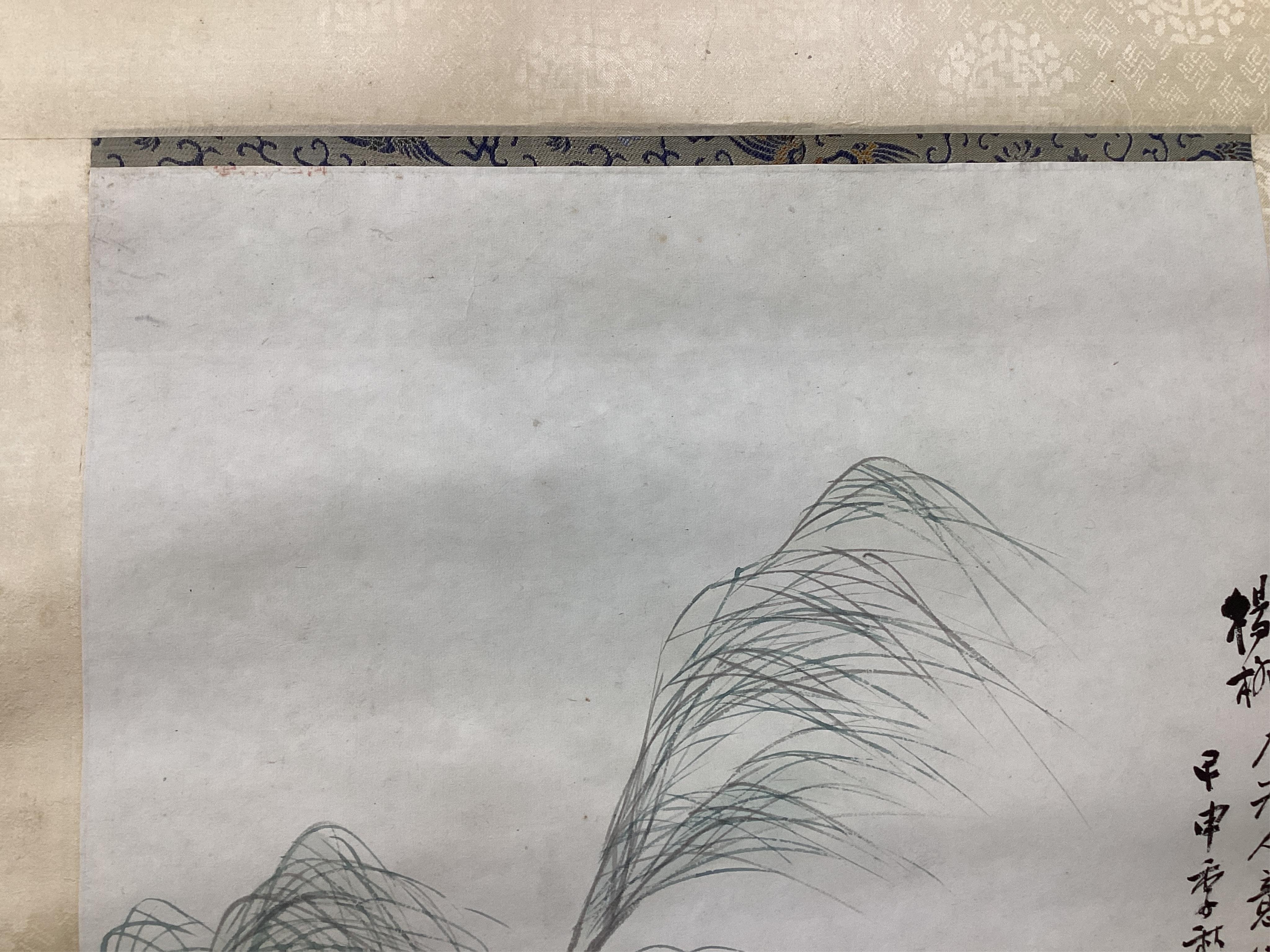 A set of four Chinese scroll paintings of ladies before landscapes, 48cm wide. Condition - fair